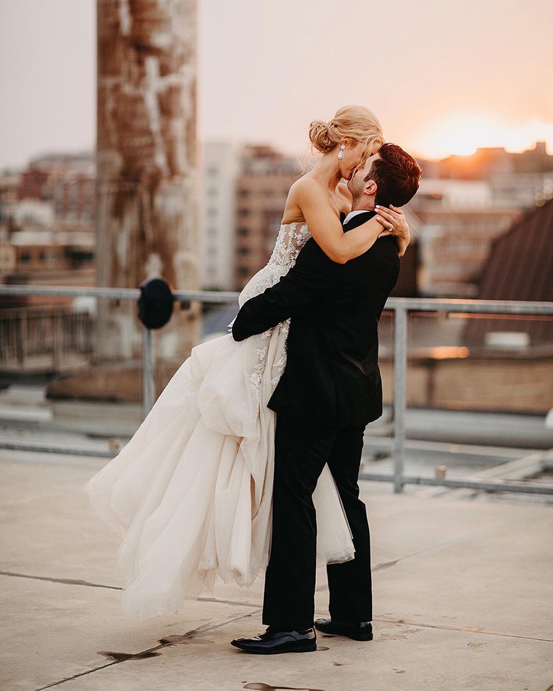 Wedding Kiss On A Background Of Happy Guests