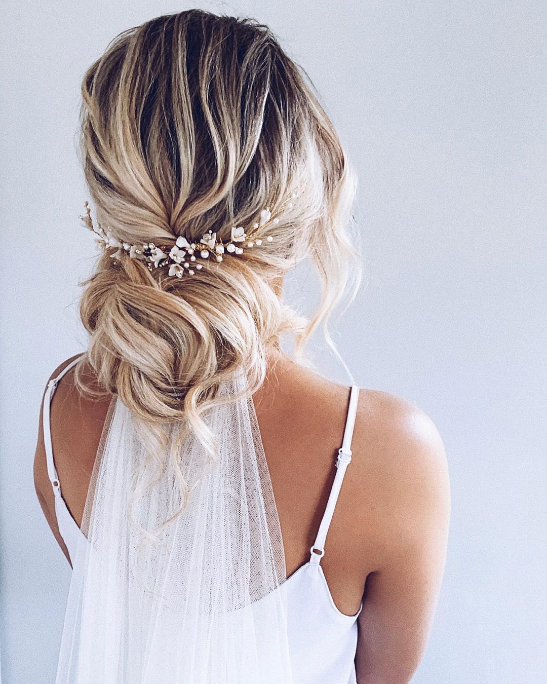 Bridal Look with Veil and Flowers