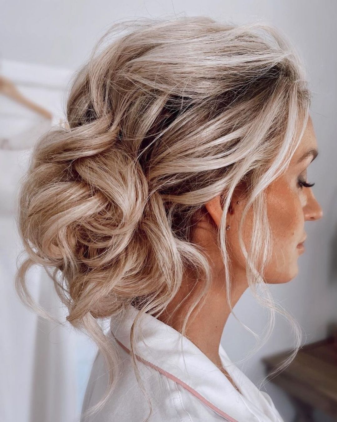 Curly Side Bun Wedding Hairstyle