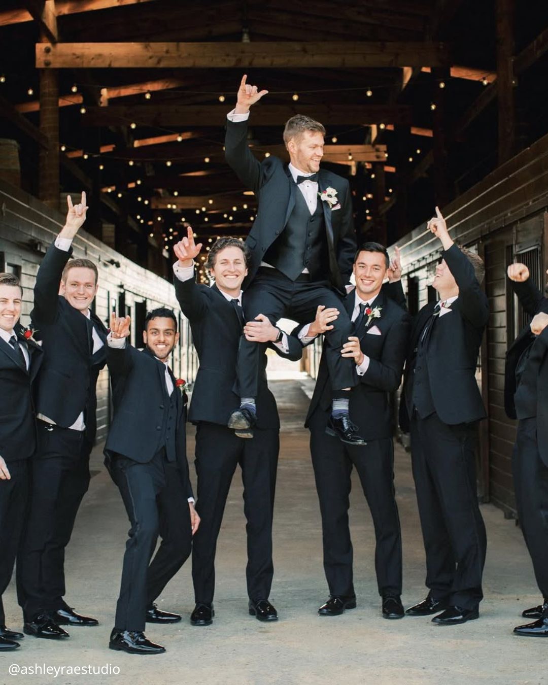 wedding photos groom with friends they hold him on hands funny photo ashleyraestudio