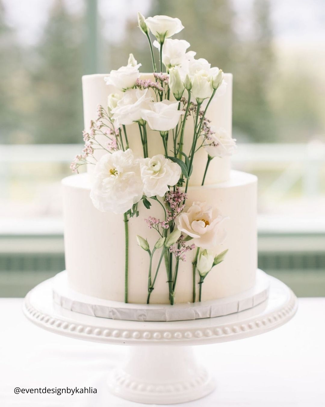 White Cakes With Flowers Decorations