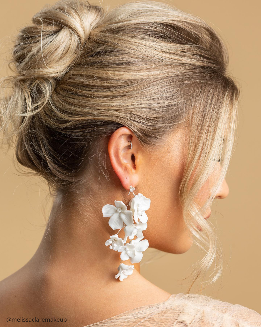 Low Bun With Wispy Bangs
