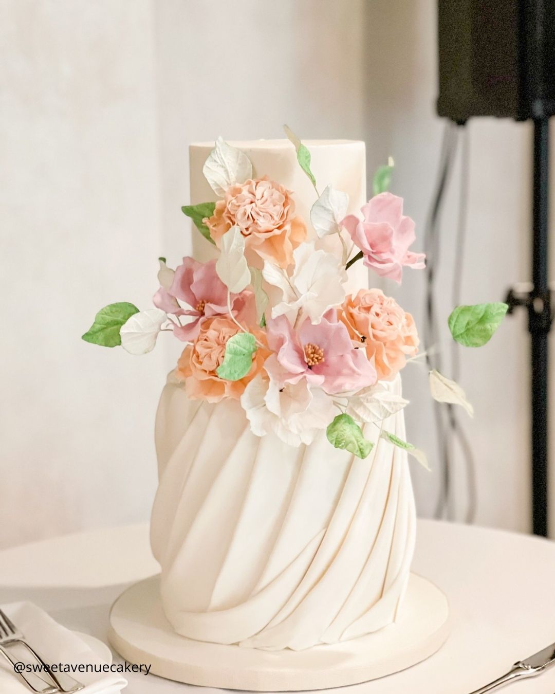 wedding cake trends small cream two tier ruffled wedding cake with peach sugar flowers