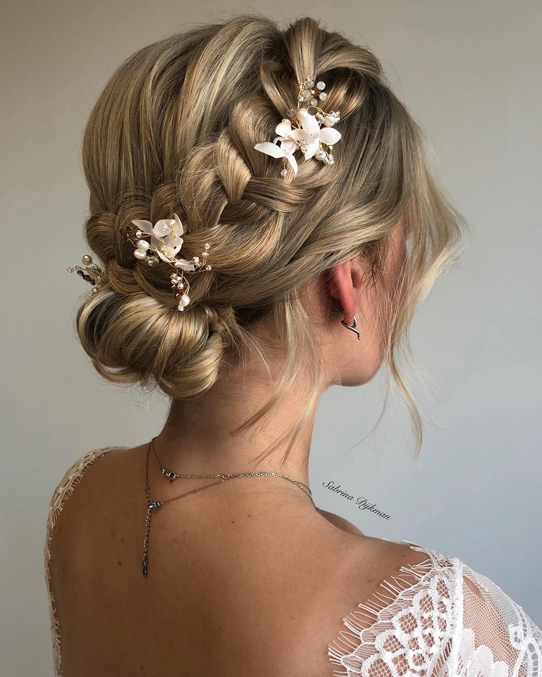 Cultural Grace: Traditional Braided Bun With Floral Kanzashi